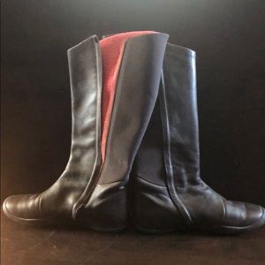 TSUBO Knee high brown leather boots.